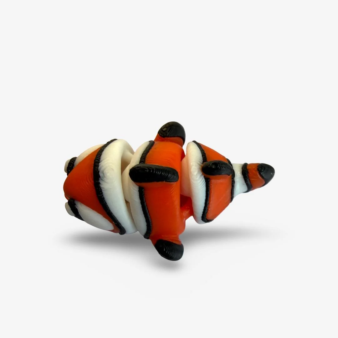 Mini 3D drukāta lokana klaunzivs – oranža dekoratīva figūriņa