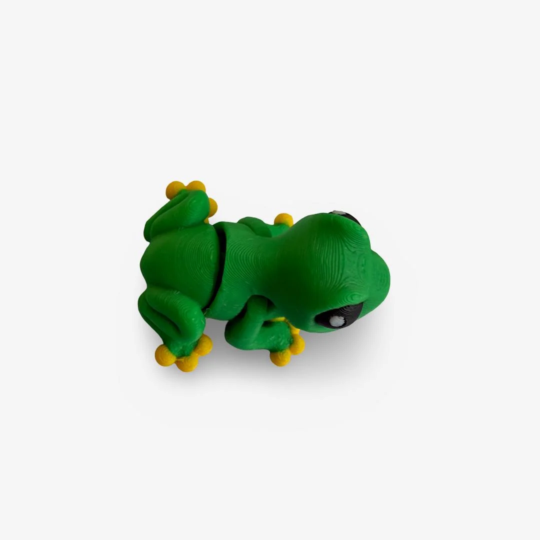 3D drukāta kustīga vardīte – zaļa ar dzeltenām ķepiņām