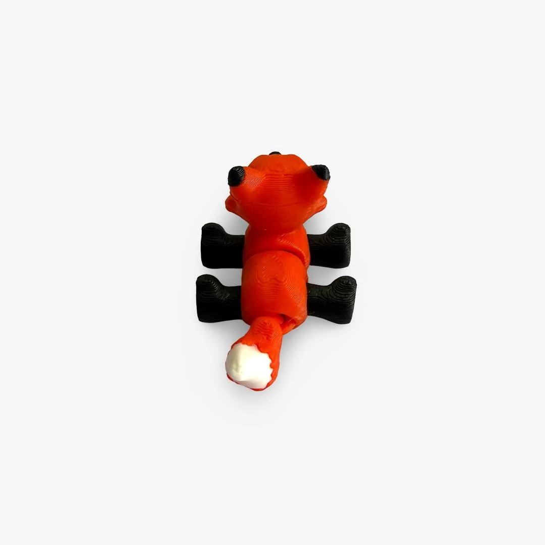 Mini 3D drukāta lapsiņa – oranža ar melniem un baltiem akcentiem